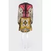 A dress in an abstract print with a hardbred collar