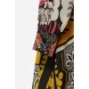 A dress in an abstract print with a hardbred collar