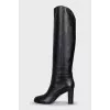 Black leather boots with heels