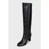 Black leather boots with heels