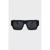 Black sunglasses with gold logo