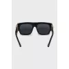 Black sunglasses with gold logo