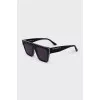 Black sunglasses with white trim