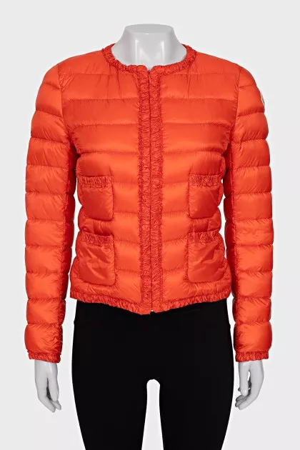 Orange jacket with a round collar