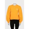 Orange sweatshirt with puff sleeves