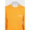 Orange sweatshirt with puff sleeves