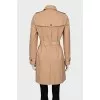 Beige single-breasted trench coat