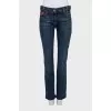 Blue straight-leg jeans with silver logo