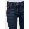 Blue straight-leg jeans with silver logo