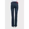 Blue straight-leg jeans with silver logo