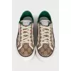 Brown sneakers with a signature print