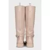 Beige boots with gold decor