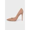 Beige suede pumps
