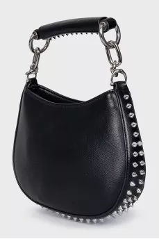 Bag decorated with spikes