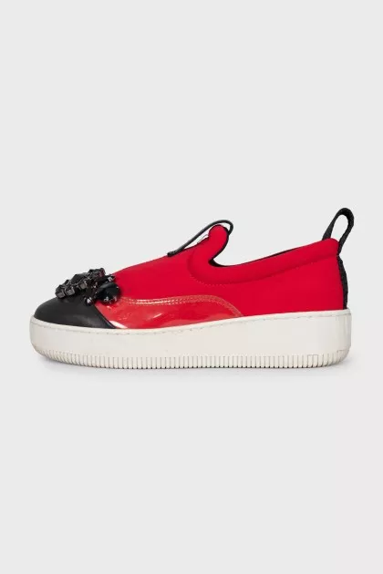 Red slip-ons with crystals