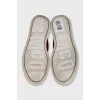 Red slip-ons with crystals