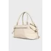 Leather bag with patch pocket