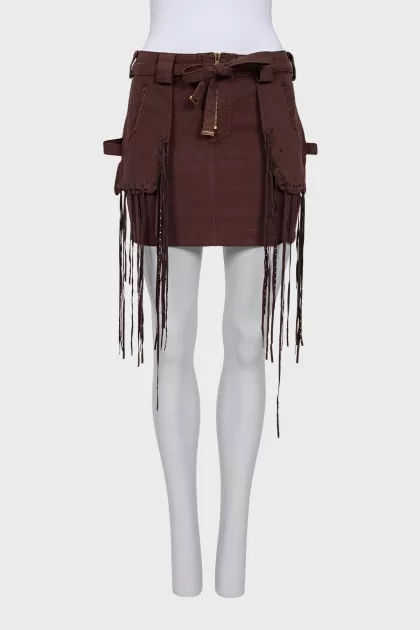 Denim skirt decorated with fringe