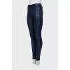 Slim-fit trousers with a side zipper