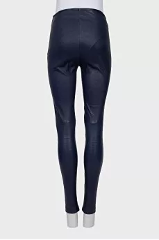 Slim-fit trousers with a side zipper