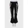 Cropped trousers decorated with sequins