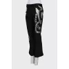 Cropped trousers decorated with sequins