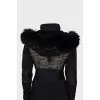 Fitted jacket decorated with fur