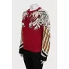 Red sweater with a print
