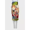 Silk skirt with a bright print and a belt