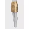 Golden leather skirt