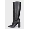 Leather boots with accent stitching