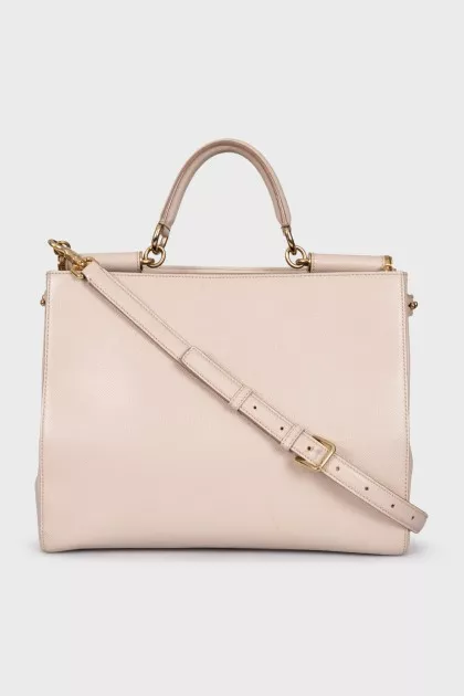Leather bag with handle and strap