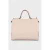 Leather bag with handle and strap