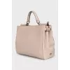 Leather bag with handle and strap