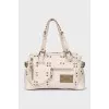 Leather bag with rivets