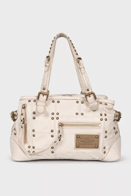 Leather bag with rivets
