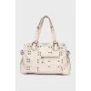 Leather bag with rivets