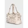 Leather bag with rivets