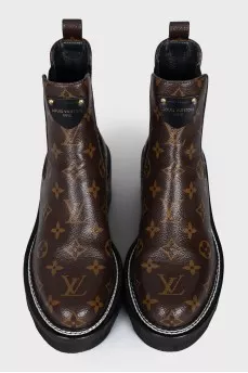 Canvas boots with a signature print