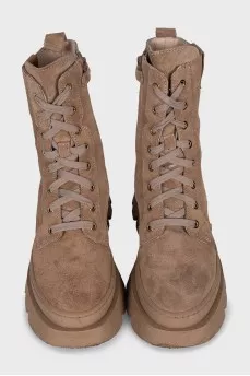 Suede boots with a zipper and laces