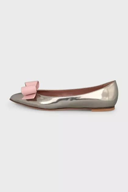 Silver ballet flats with a bow