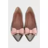 Silver ballet flats with a bow