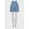 High-waisted shorts with a signature print