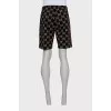 Men's shorts with a signature print