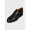 Men's leather shoes with perforations and laces