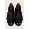 Men's leather shoes with perforations and laces
