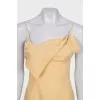 Linen dress with an asymmetrical top