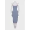 A fitted grey dress in a signature print