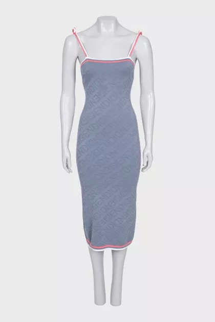A fitted grey dress in a signature print
