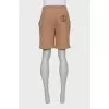 Men's shorts with a patch on the pocket